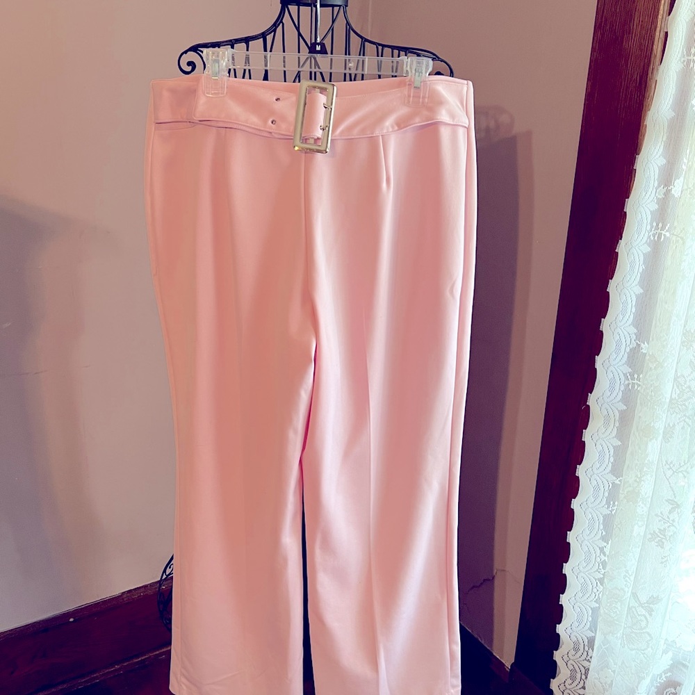 Soft pink wide leg pants with silver buckle belt